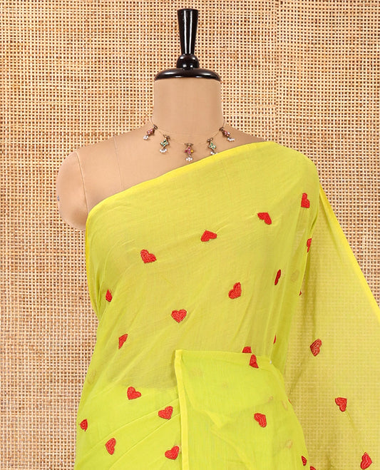 Borderless Parrot Green Mul Cotton Saree, Delicately Woven with Heart Motifs Embroidered All Over Its Body, a Self-Pallu, and Paired with a Matching Blouse