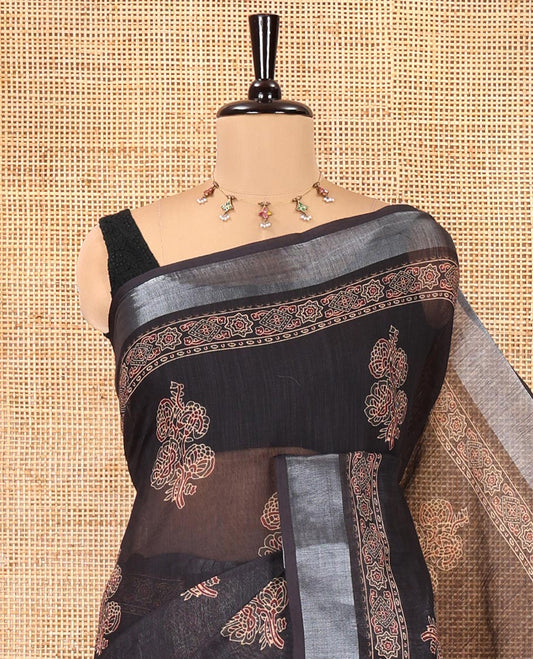 Black Linen Cotton Saree, Subtly Enriched with Ajrakh-Style Floral Motifs Block Print, a Subtle Zari Border, Pallu of Ajrakh-Style Intricate Print, and Paired with a Matching Blouse