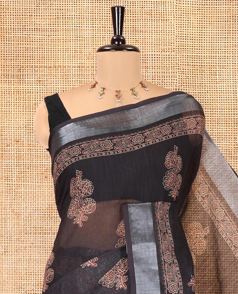 Black Linen Cotton Saree, Subtly Enriched with Ajrakh-Style Floral Motifs Block Print, a Subtle Zari Border, Pallu of Ajrakh-Style Intricate Print, and Paired with a Matching Blouse