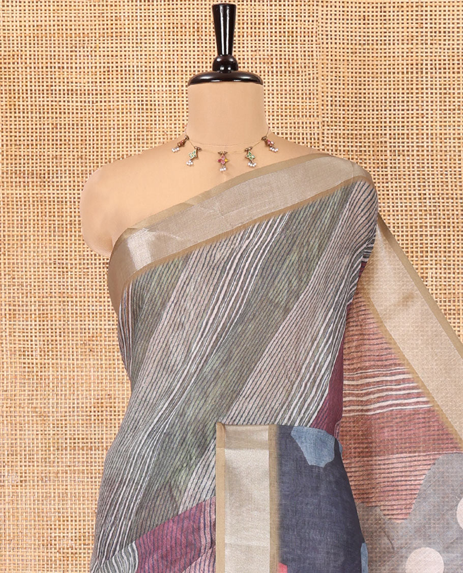 Grey Linen Cotton Saree, Finely Printed with Leheriya-Style Abstract Print on Its Body, Complemented by a Subtle Contrast Bavanji Border, Pallu Features Deer Motifs Print, and Paired with a Contrast Blouse