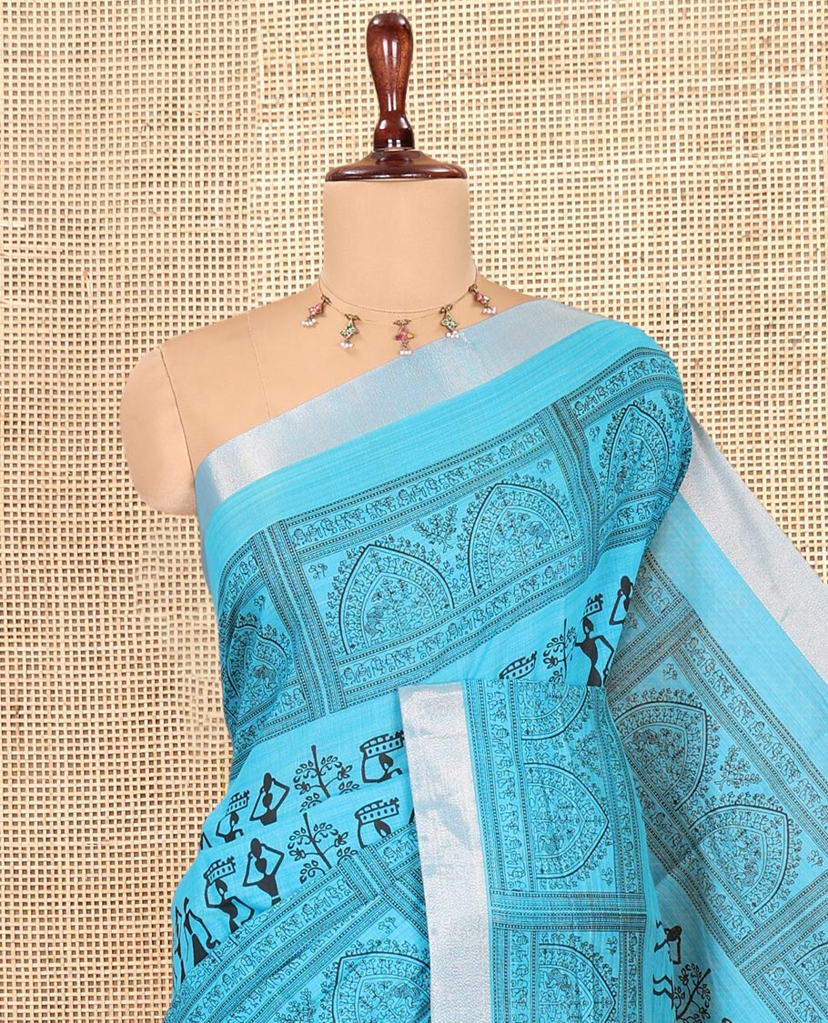 Sky Blue Semi-Silk Cotton Saree, Adorned with Warli Print, a Tissue Border, Contrast Warli Printed Pallu, and a Contrast Blouse