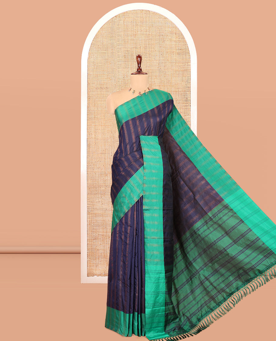 Navy Blue Semi-Soft Silk Saree, Elevated with Chevron Stripes, Complemented by a Contrast Zari Striped Border, and a Contrast Blouse