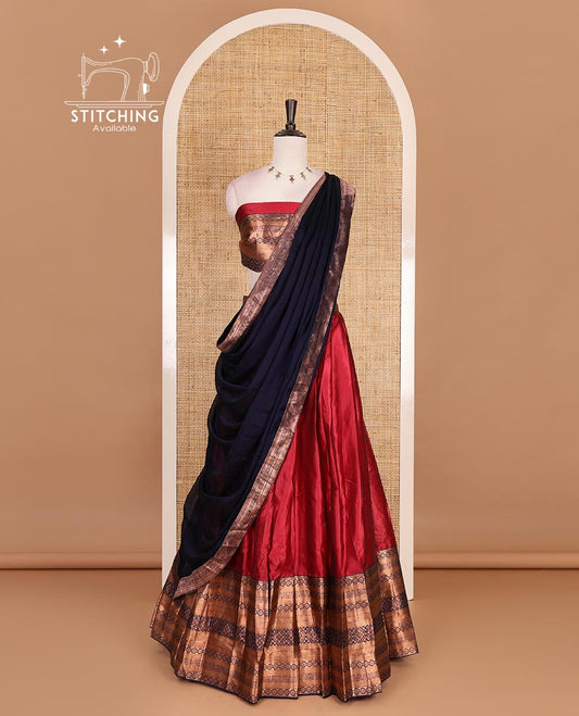 Red taffeta silk half saree, plain with contrast dark blue traditional zari big border, matching zari blouse, and contrast plain zari border dhavani