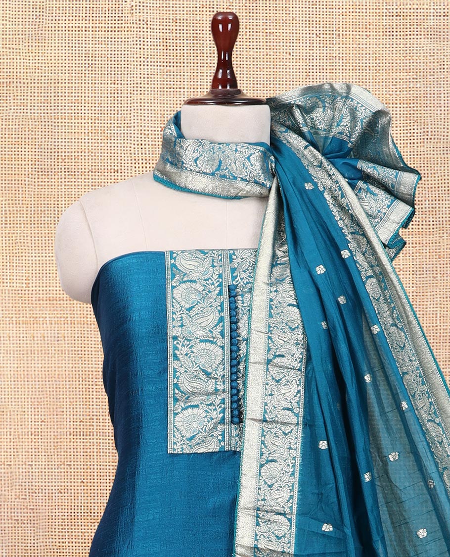 Peacock Blue Material Churidar Set Features Gold Zari Neck Work Top, a Plain Santoon Bottom, a Banarasi Dupatta