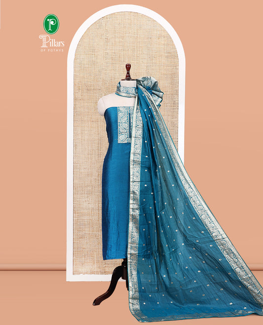 Peacock Blue Material Churidar Set Features Gold Zari Neck Work Top, a Plain Santoon Bottom, a Banarasi Dupatta