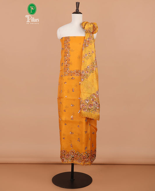 Lemon yellow floral print, stone, mirror work organza chudidhar material top with santoon material pant & floral print, mirror work dupatta