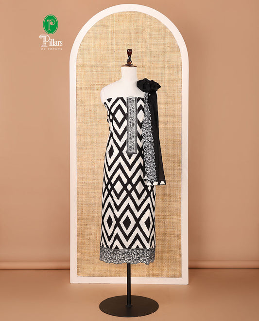White & black cotton chudidar material set, zig-zag print & neck embroidery top, plain bottom & floral embroidered dupatta