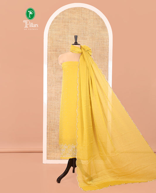 Yellow Moss Organza Material Churidar Set, Embellished with Floral Embroidery and Stone Struck on Its Top, a Plain Santoon Bottom, and Paired with a Moss Organza Stone Work Scallop Dupatta