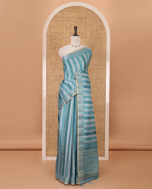 Rama blue hand brushing-style vertical stripes printed fancy tussar silk saree, zig zag-style zari woven border, zari pallu & striped blouse