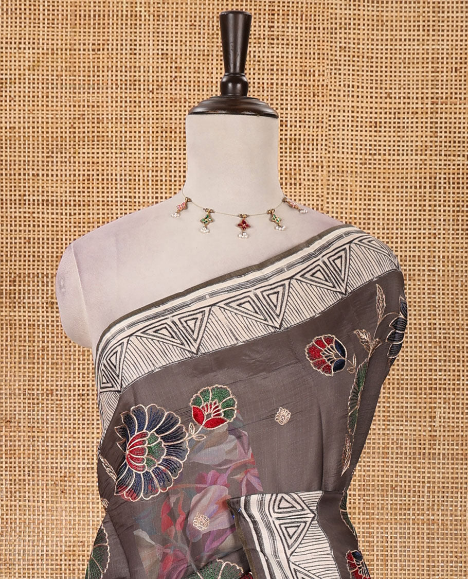 Mauve brown floral print & multi-color floral thread embroidered fancy tussar silk saree, triangle motif print & embroidered border & matching blouse of print & embroidery