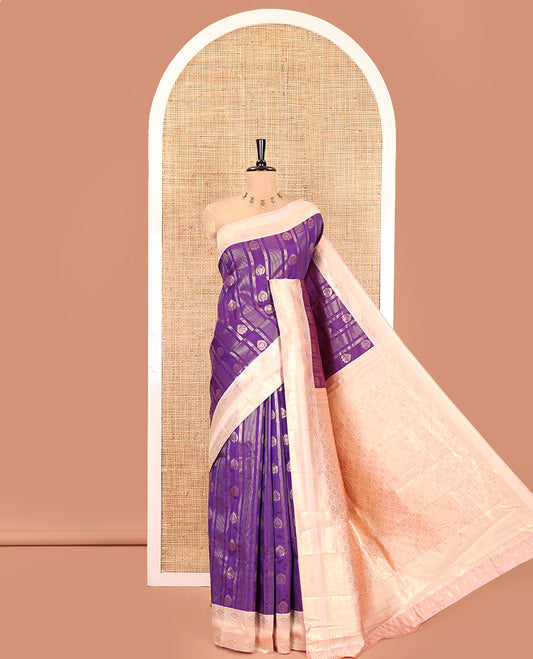 Magenta Pink Litchi Saree, Adorned with Vaira Oosi Stripes and Zari Buttas on Its Body, Complemented by a Contrast Rettai Pettu Traditional Zari Design Border, an Intricately Designed Pallu, and Paired with a Contrast Blouse