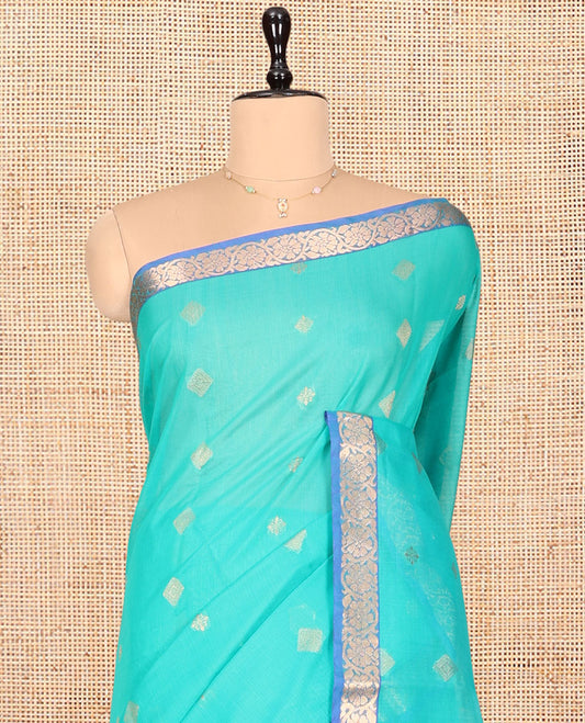 Blue Silk Cotton Saree, Adorned with Zari Buttas, Complemented by Contrast Floral Creeper Border, a Pallu of Intricate Designs, and Contrast Blouse