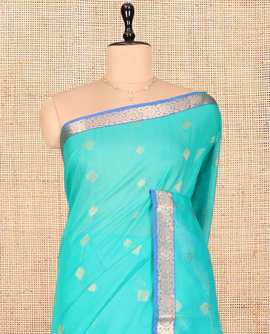 Blue Silk Cotton Saree, Adorned with Zari Buttas, Complemented by Contrast Floral Creeper Border, a Pallu of Intricate Designs, and Contrast Blouse