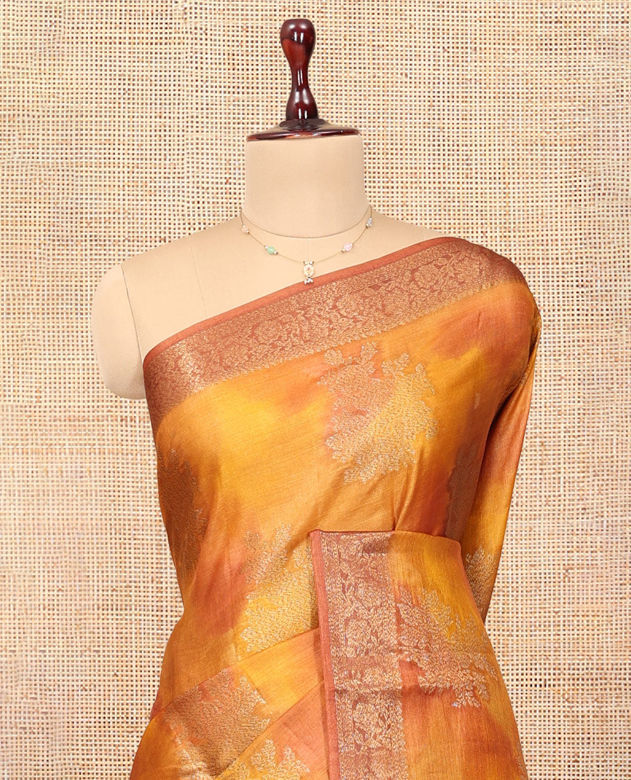 Yellow-Orange Tussar Silk Saree, Subtly Sparkled with Zari Buttas, Highlighted by a Zari Border, Floral Design Pallu, and a Matching Blouse