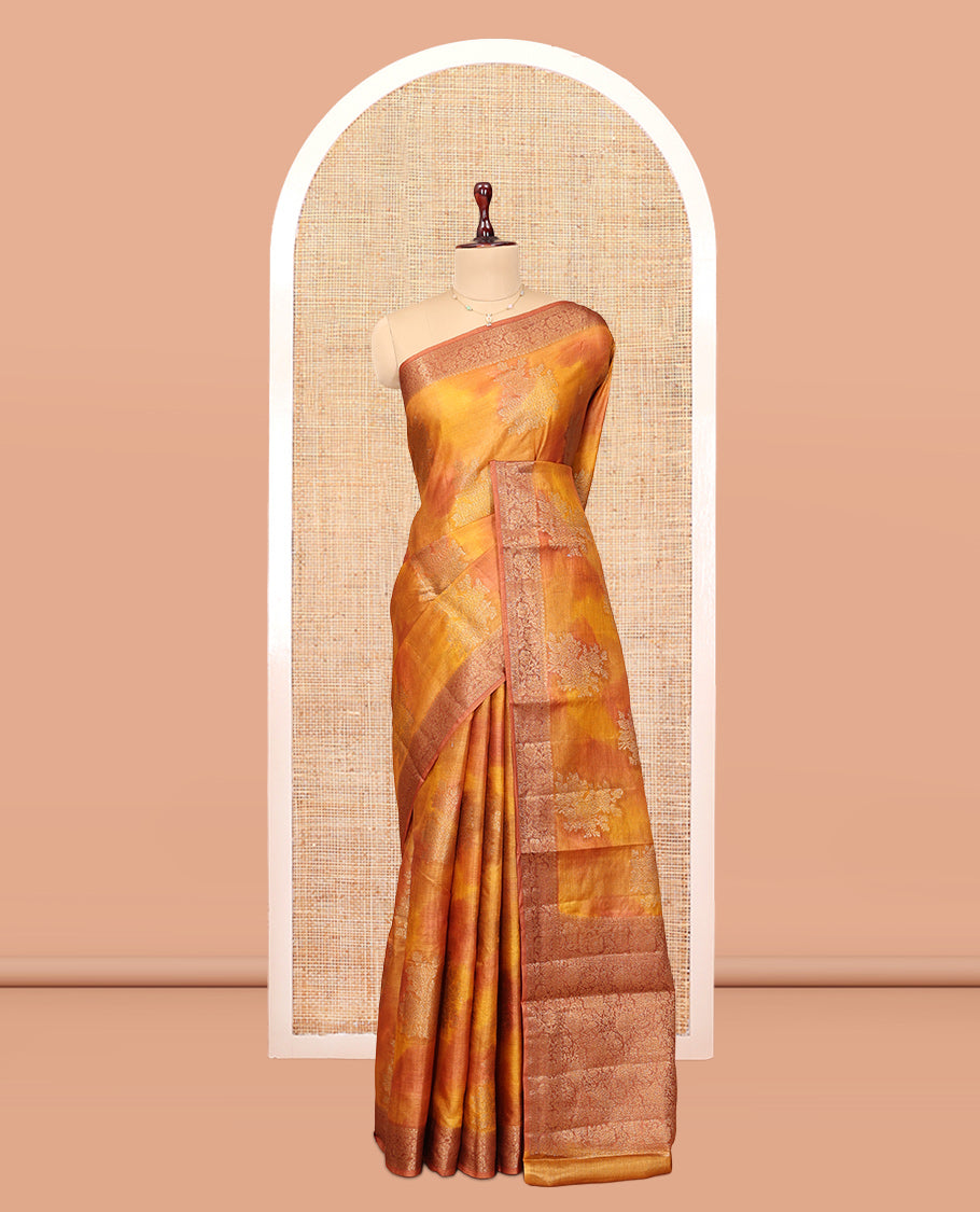 Yellow-Orange Tussar Silk Saree, Subtly Sparkled with Zari Buttas, Highlighted by a Zari Border, Floral Design Pallu, and a Matching Blouse