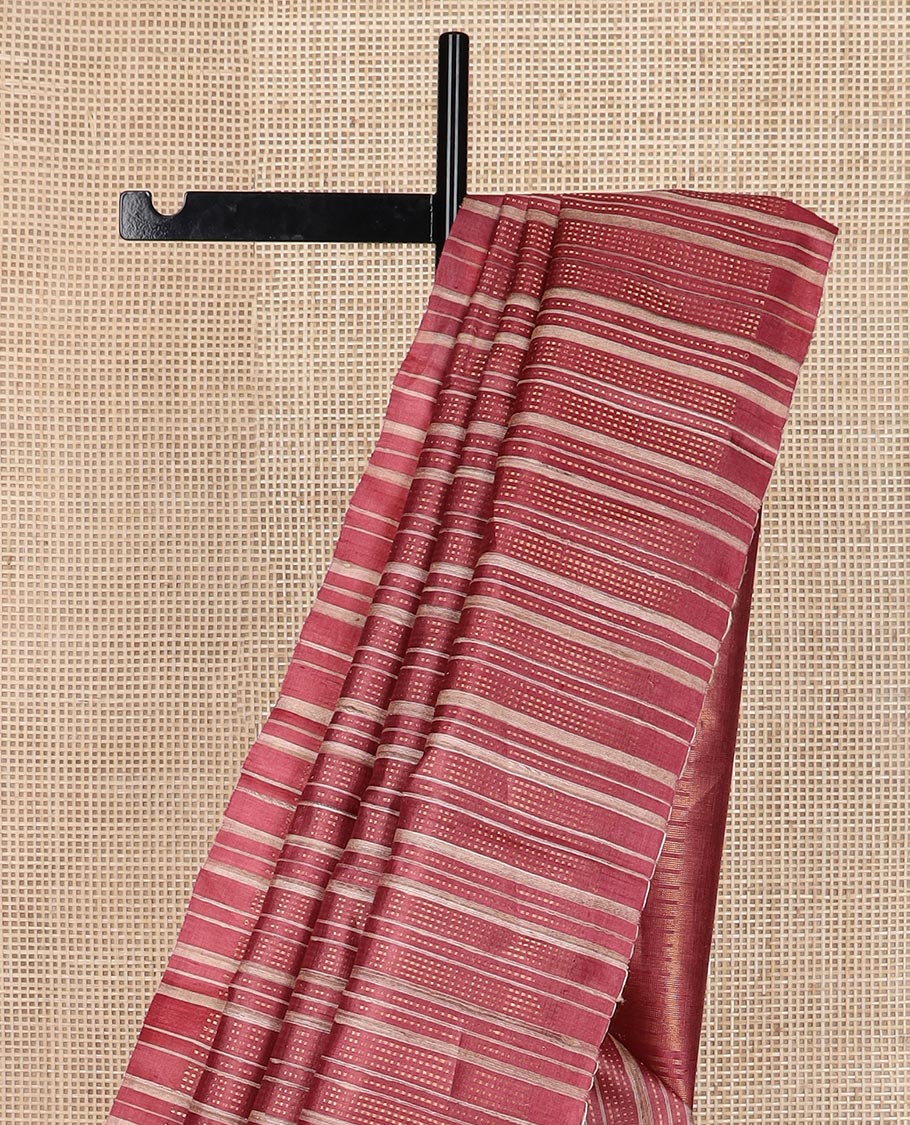 Brown vertically striped tussar silk saree, striped border and temple pallu