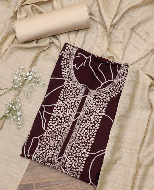 Maroon material churidar set, floral printed and embroidered top, contrast plain bottom, and a sequins embroidered dupatta
