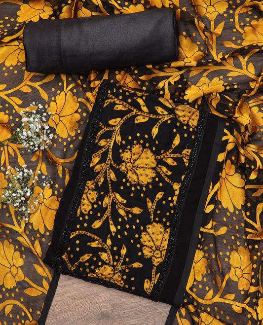 Black material chudidar set, yellow floral vine print with black micro stone neck work top, plain bottom and floral vine printed dupatta
