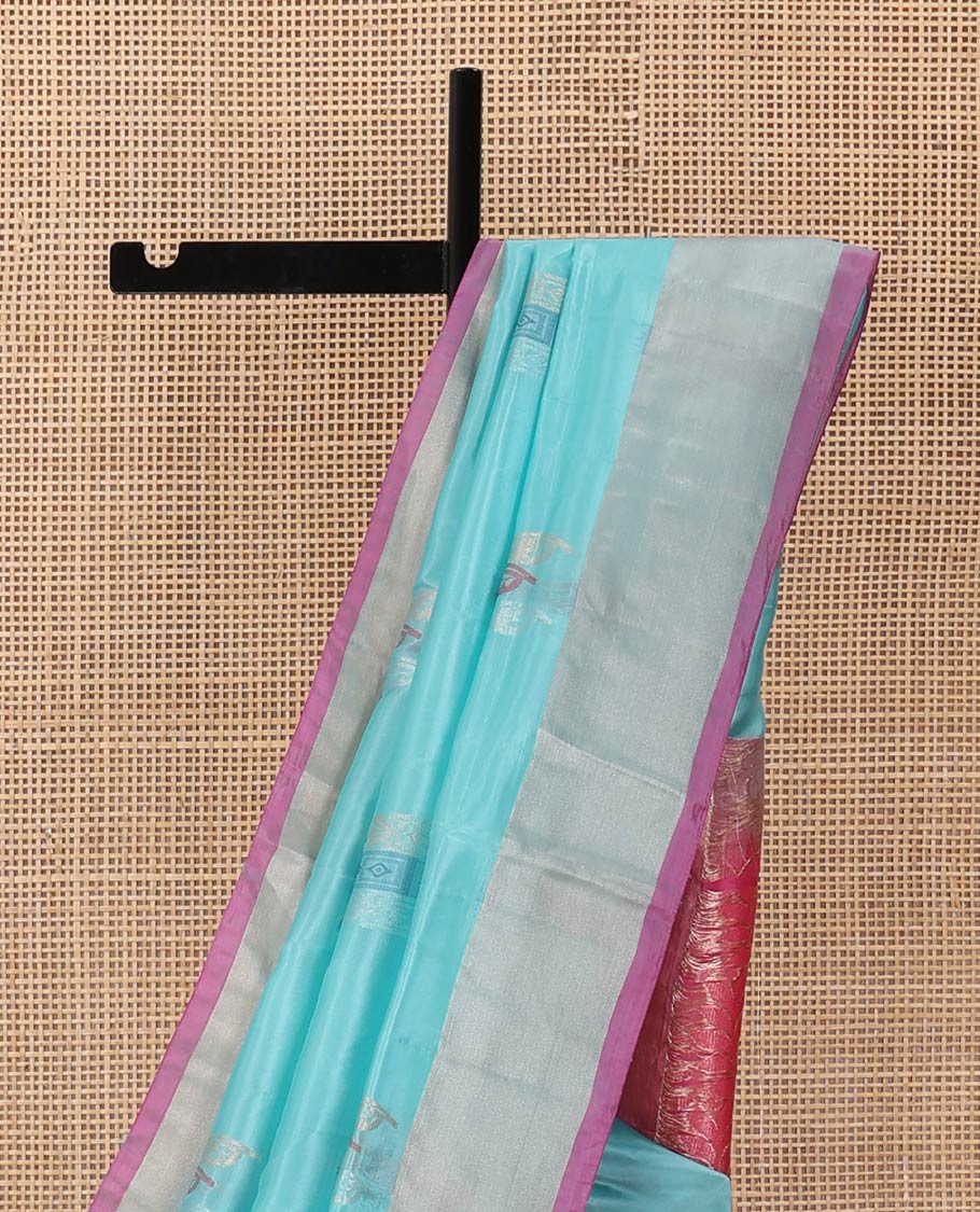 Blue zari buttas Uppada saree, contrast bavanji border, and leaf design pallu