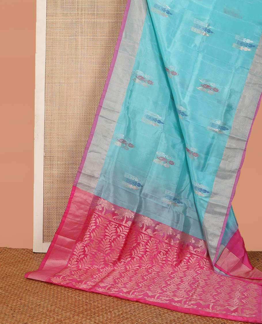 Blue zari buttas Uppada saree, contrast bavanji border, and leaf design pallu