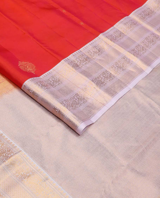 Orange zari buttas Vasundhara silk mix saree, contrast border of rekku, muthu, yaali, and mayil kann designs, and jaal pallu