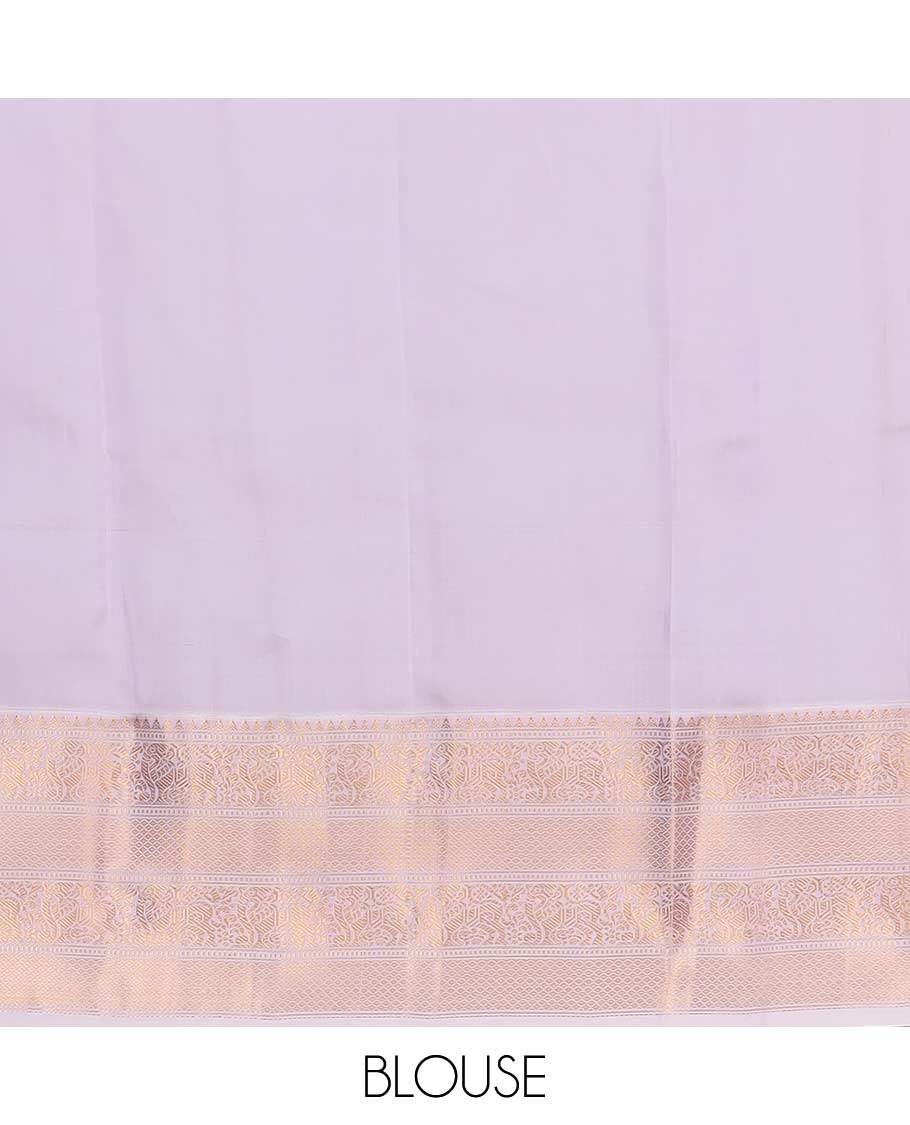 Orange zari buttas Vasundhara silk mix saree, contrast border of rekku, muthu, yaali, and mayil kann designs, and jaal pallu