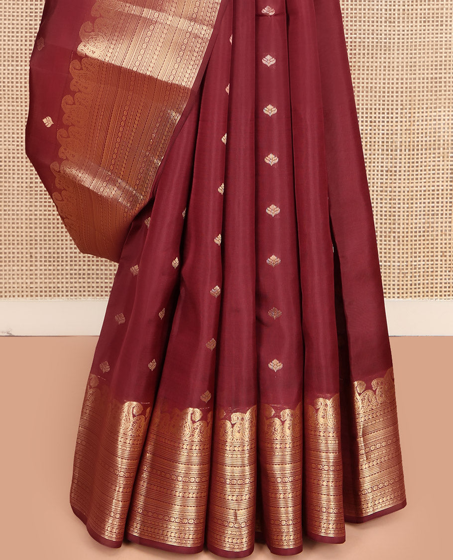 Maroon Vasundhara Lite Silk Mix Saree, Prettified with Zari Buttas, Highlighted by a Zari Border of Manga,  and Geometric Designs, Pallu Adorned with Jaal Designs, and Paired with a Matching Blouse