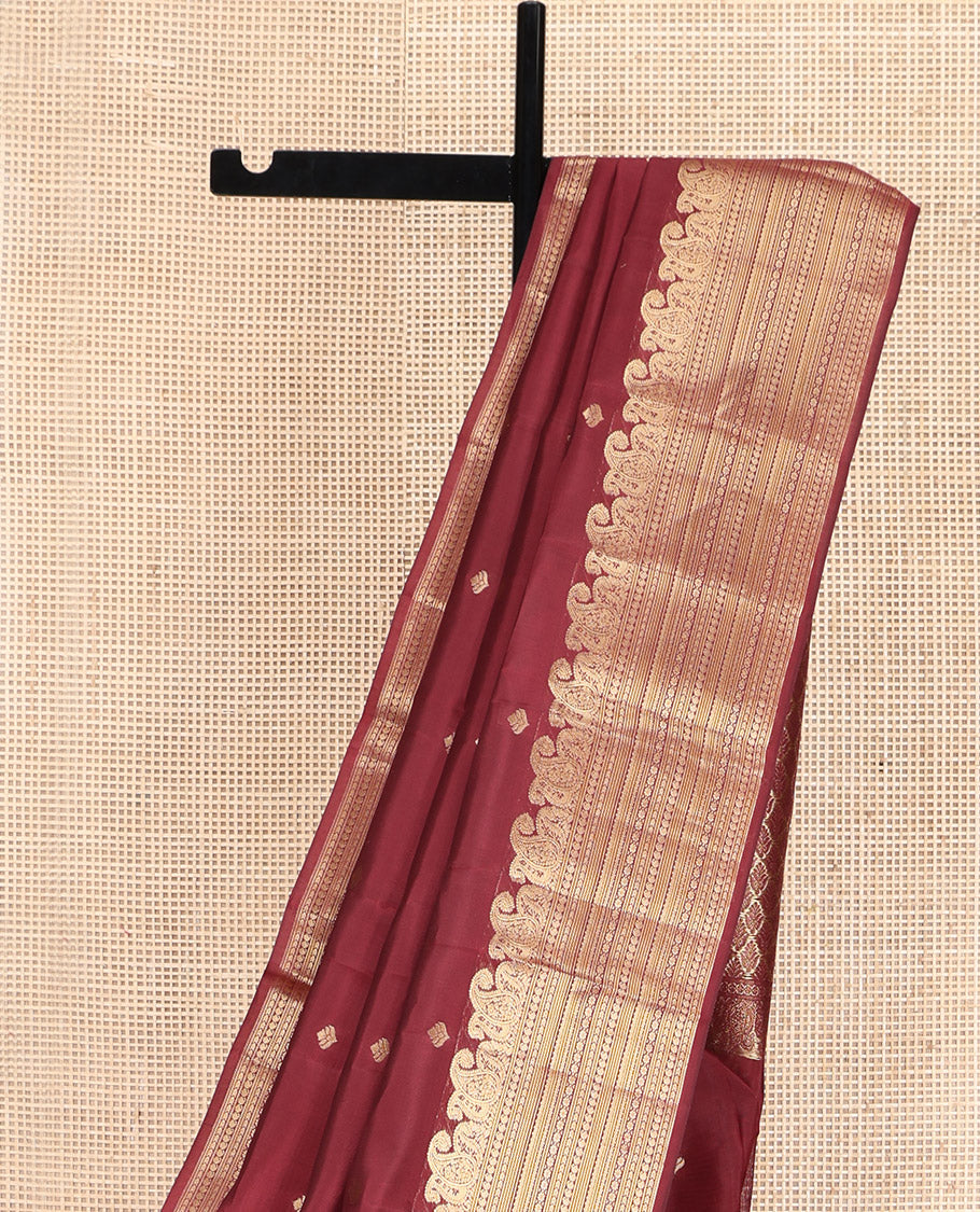 Maroon Vasundhara Lite Silk Mix Saree, Prettified with Zari Buttas, Highlighted by a Zari Border of Manga,  and Geometric Designs, Pallu Adorned with Jaal Designs, and Paired with a Matching Blouse