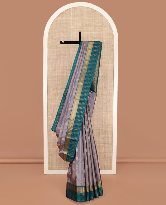 Grey Vasundhara Lite Silk Mix Saree, Adorned with Iruthalai Pakshi Buttas on Its Body, Complemented by a Contrast Border of Rekku, Muthu, Poun, and Jaal Designs, Grand Jaal Pallu, and Paired with a Contrast Blouse