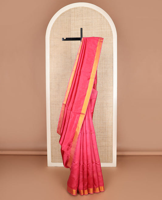 Pink buttas banana pith saree, bavanji zari border, and zari striped pallu