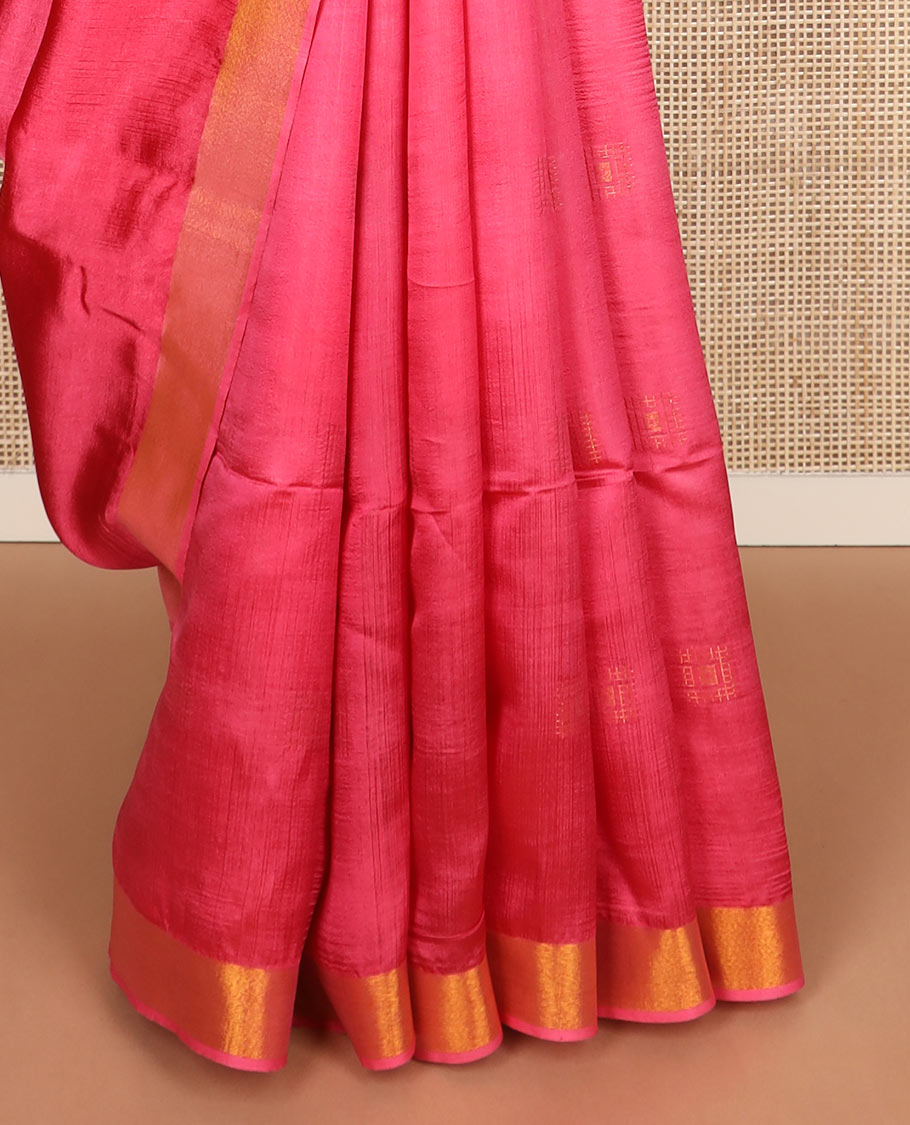 Pink buttas banana pith saree, bavanji zari border, and zari striped pallu