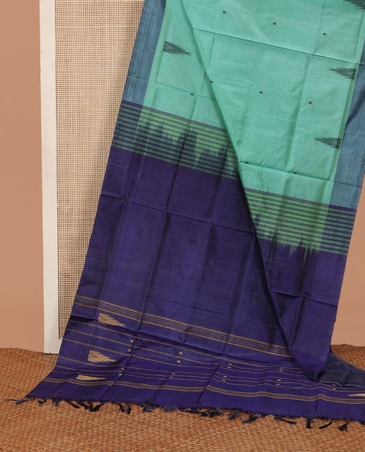 Green temple buttas banana pith saree, contrast plain border, and pallu of temple and stripes
