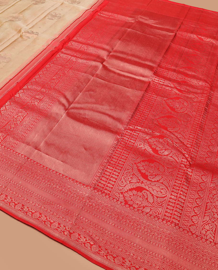 Gold iruthalai pakshi buttas woven silk saree, contrast border of thilakam mokku, neli, and kodi visiry designs, and pallu of traditional zari designs