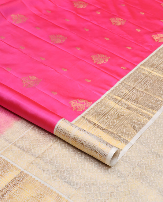 Pink zari buttas silk saree, contrast border of thilakam, diamond, laddu kamalam, muthu, kathir, mayil and chakram designs, and jaal pallu
