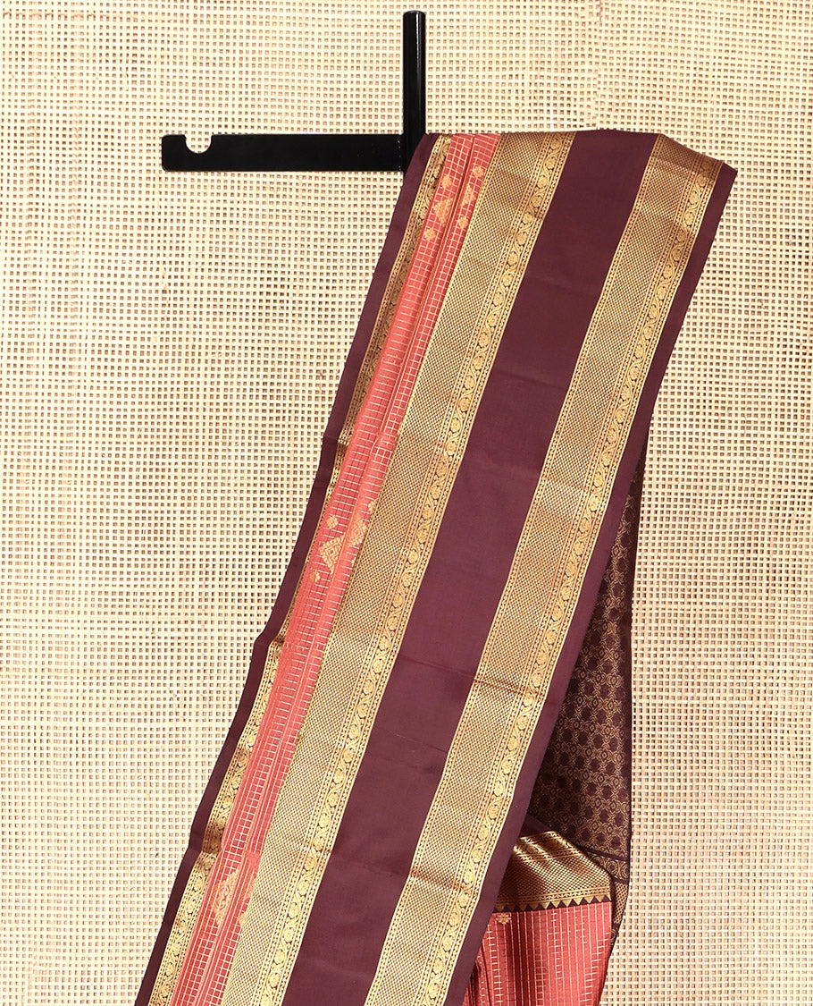 Peach Vasundhara Silk Saree, Accentuated with Zari Buttas and Checks, a Contrast Rettai Pettu Border of Rekku, Neli, Kodi Visiry, and Mayil Kann Designs, Grand Pallu, and a Contrast Blouse