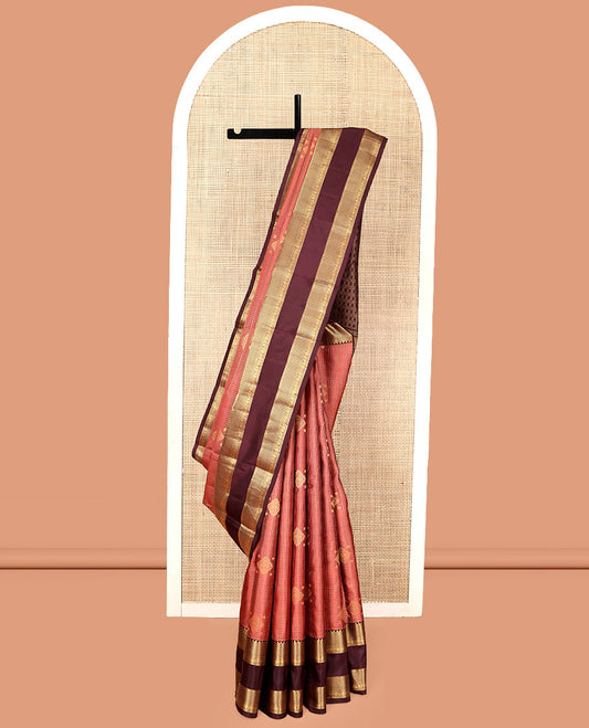 Peach Vasundhara Silk Saree, Accentuated with Zari Buttas and Checks, a Contrast Rettai Pettu Border of Rekku, Neli, Kodi Visiry, and Mayil Kann Designs, Grand Pallu, and a Contrast Blouse