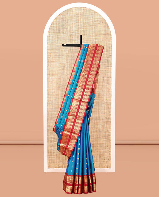 Blue Vasundhara Silk Saree, Crafted with Zari Buttas, Complemented by a Contrast Border of Rekku, Neli, Manga, and Mayil Designs, Intricate Pallu, and a Contrast Blouse