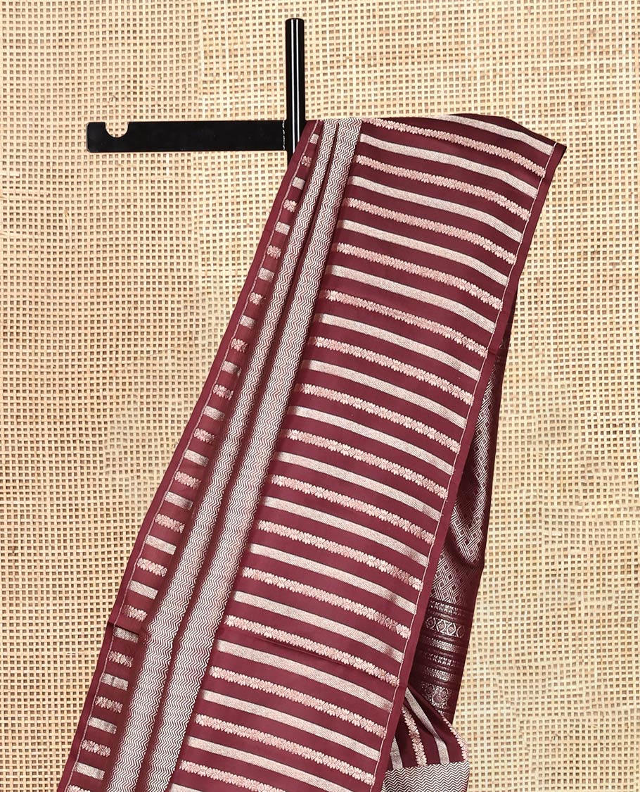 Borderless Brown Vasundhara Silk Saree, Detailed with Vanki and Zari Stripes, Highlighted by a Grand Pallu, and Matching Blouse