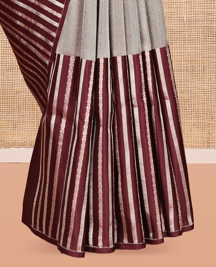Borderless Brown Vasundhara Silk Saree, Detailed with Vanki and Zari Stripes, Highlighted by a Grand Pallu, and Matching Blouse