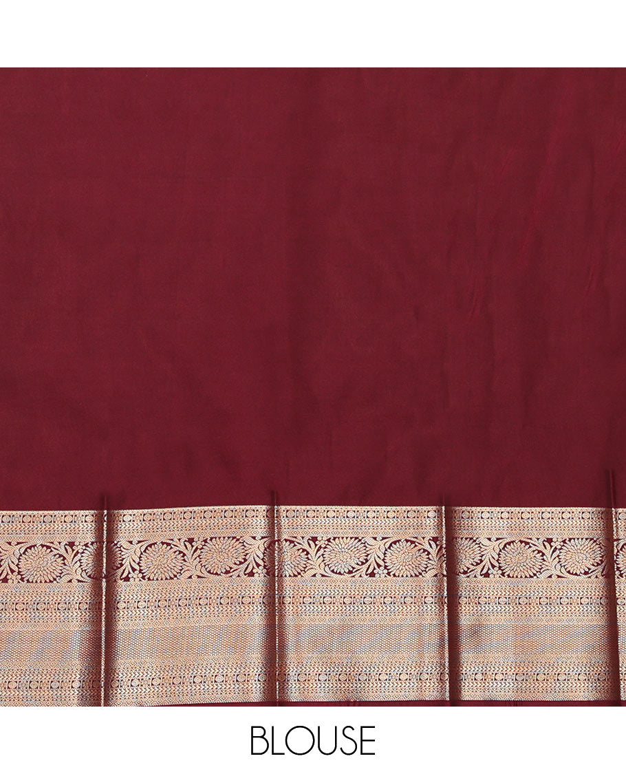 Brown Budget Silk Saree Elegantly Framed with Zari Buttas, Featuring a Contrast Traditional Zari-Design Border, Captivated with Mughal-Style Floral Butta Enclosed Arch Pallu, and a Contrast Blouse