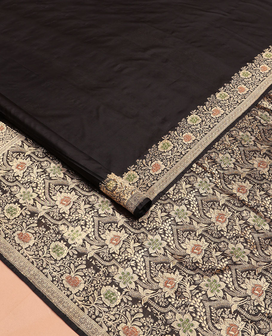 Black plain banarasi kathan silk saree,  floral creeper meenakari border, and Mughal-style arches and floral design weave