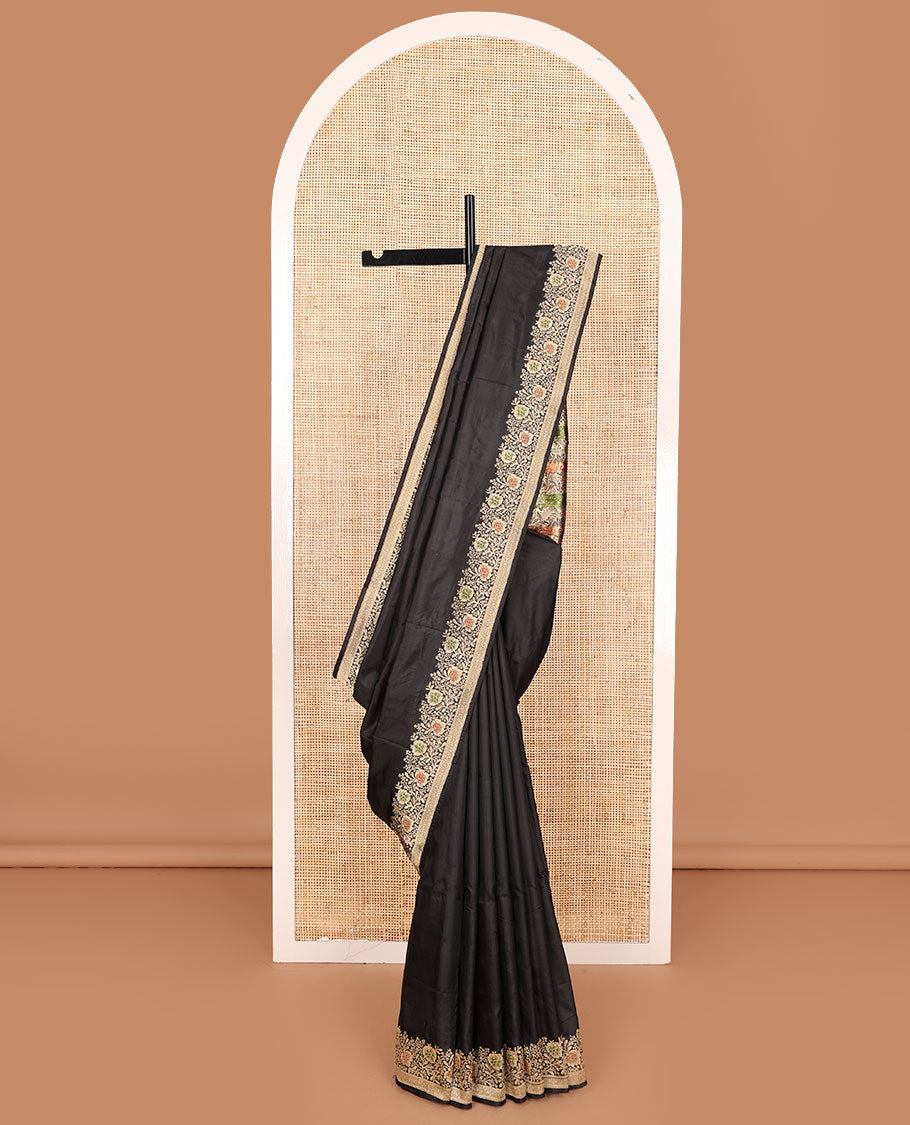 Black plain banarasi kathan silk saree,  floral creeper meenakari border, and Mughal-style arches and floral design weave