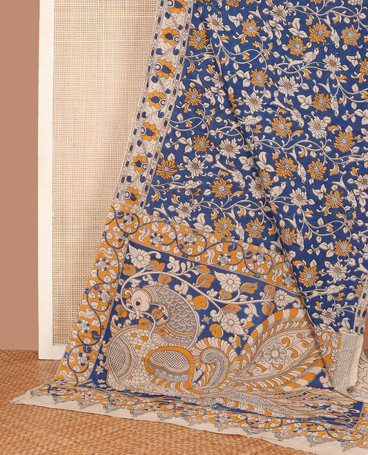 Blue floral vine & bird machine-printed kalamkari cotton saree, contrast floral creeper printed border & pallu of peacock print