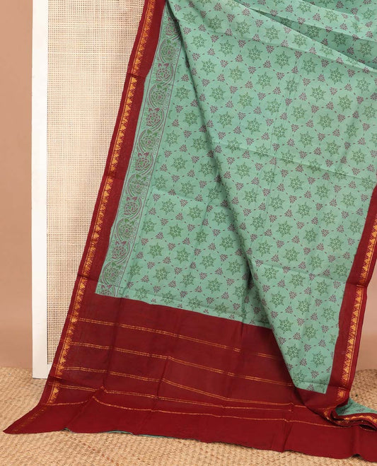 Green floral jaal printed Sungudi cotton saree, contrast temple zari border & zari striped pallu