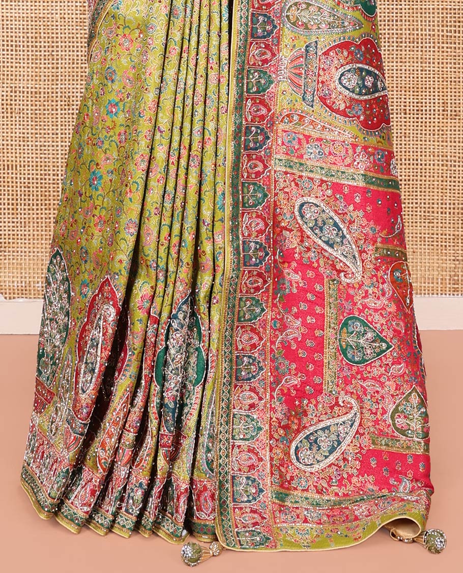Green Dola Silk Saree, Elevated with Floral and Paisley Design on Its Body, Highlighted by Intricate Mughal Border, Pallu of Floral and Paisley Design, and Paired with a Matching Blouse