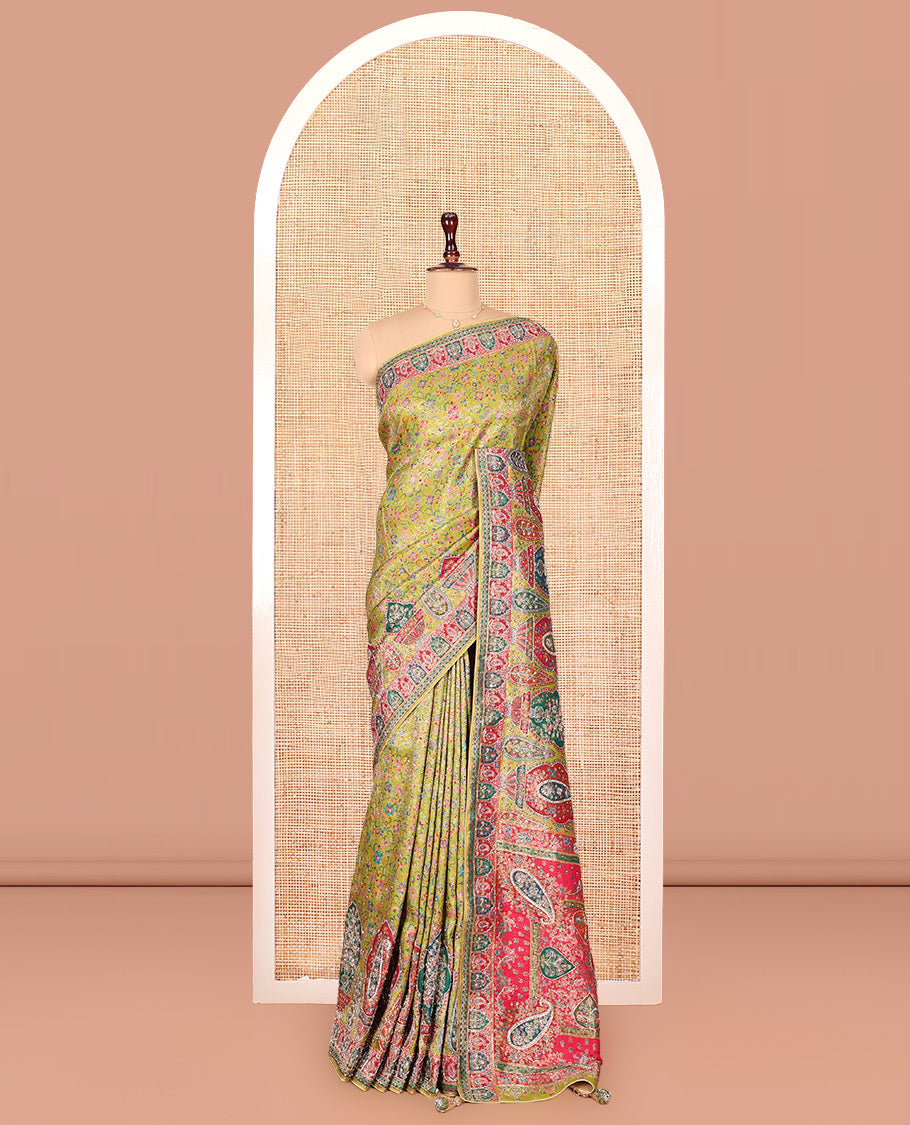 Green Dola Silk Saree, Elevated with Floral and Paisley Design on Its Body, Highlighted by Intricate Mughal Border, Pallu of Floral and Paisley Design, and Paired with a Matching Blouse