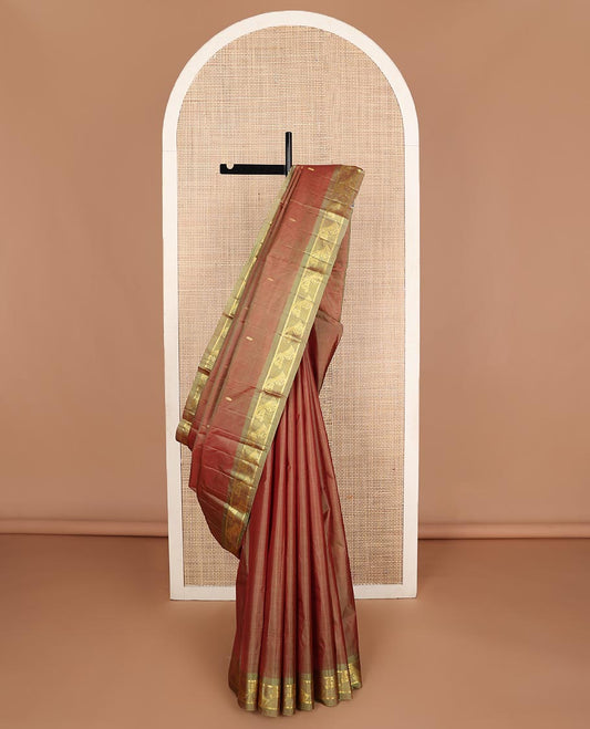 Brown zari buttas Kanchipuram silk saree, contrast instrumental theme, zari woven border of veena motifs, and zari design pallu