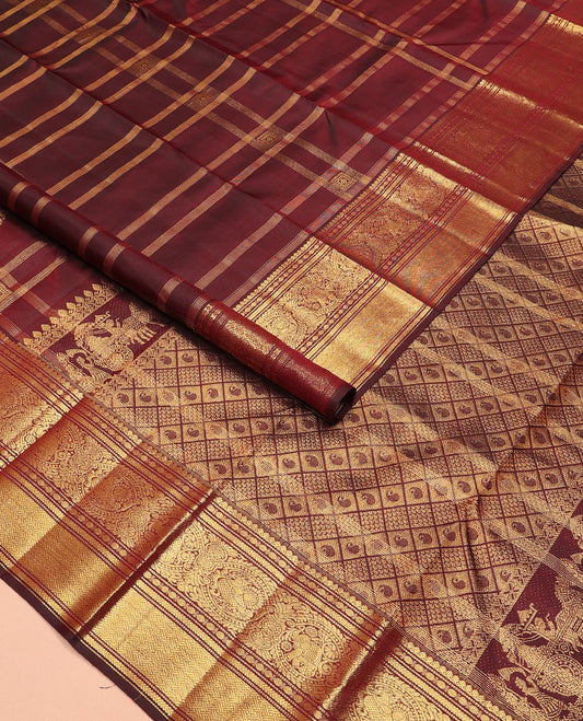Brown iruthalai pakshi buttas Kanchipuram silk saree, zari border of thilakam mokku, muthu, rudraksham, kathir, round mayil, and paiyaadi kattam, and manga butta enclosed jaal pallu