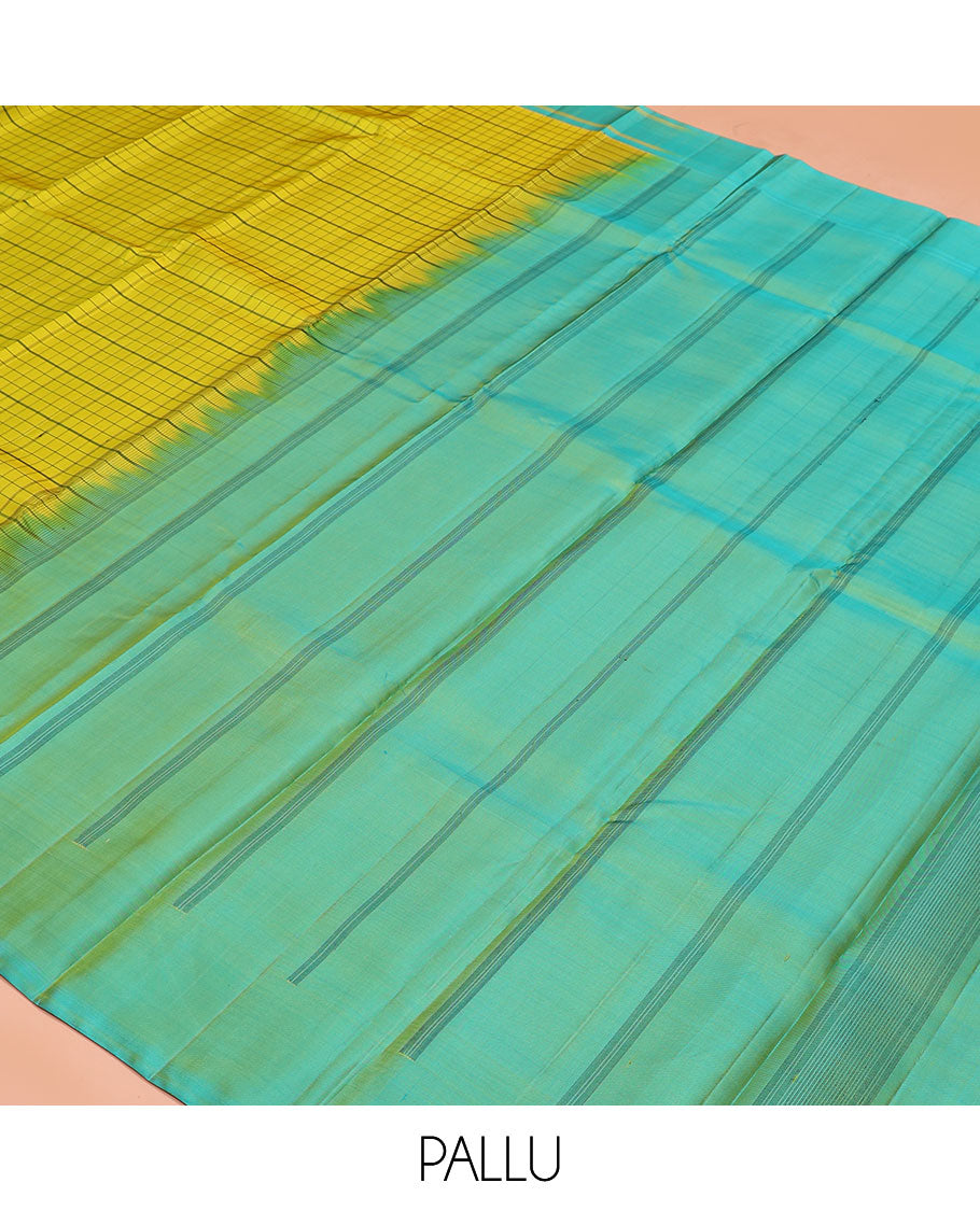 Green checked Kanchipuram silk saree, contrast striped border, and pallu of stripes