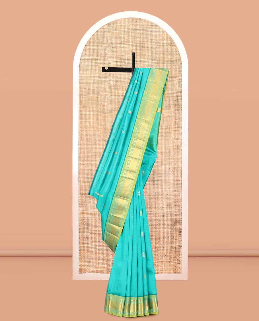 Blue Kanchipuram Silk Saree, Woven with Zari Buttas, Complemented by a Contrast Border of Panner Sombu, Banaras, Muthu, and Mayil Kann Design, Pallu of Zari Design, and No Blouse